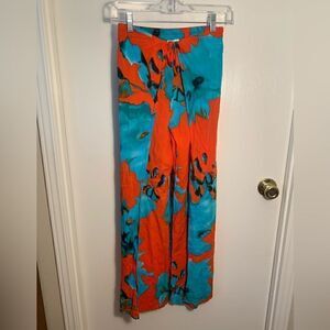 On the road EUC orange/teal open slit wide leg pants Size XS